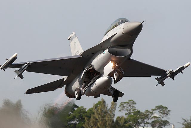 A Taiwan Air Force US-made F-16 fighter jet takes off from a highway in southern Taiwan in September 2014