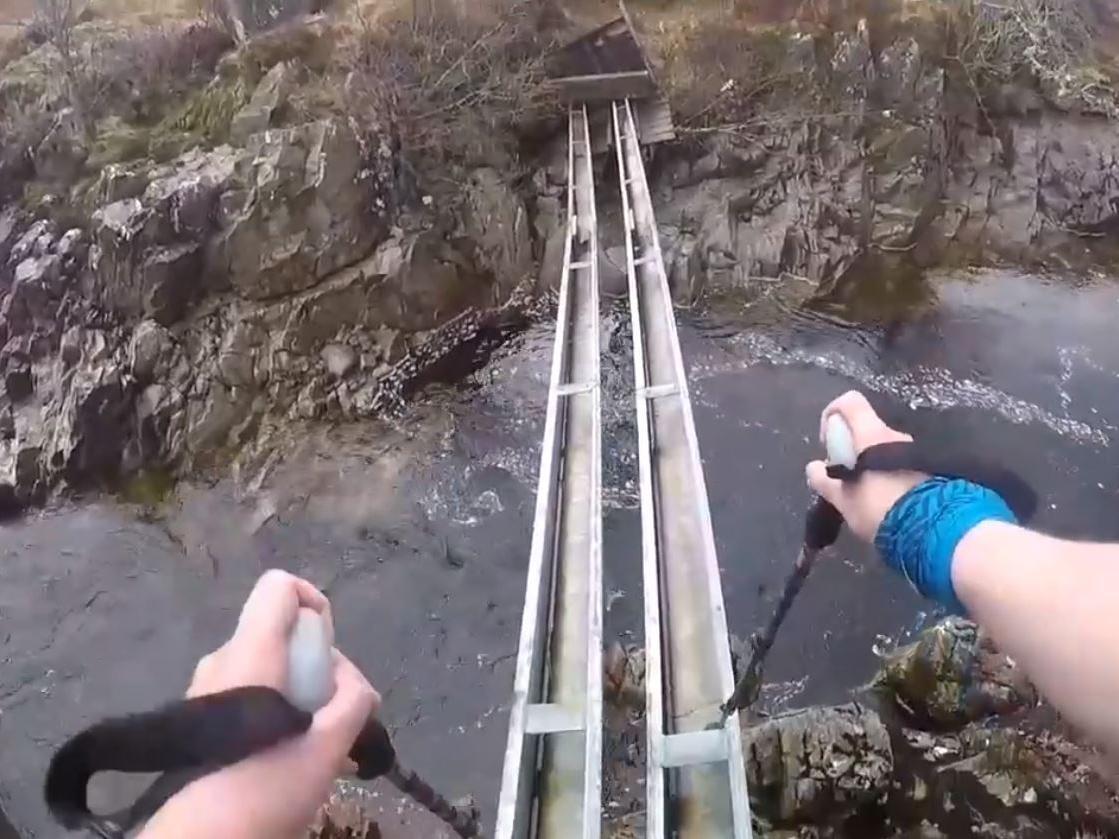 Andy O'Brien crosses a bridge at the foot of Beinn a'Chreachain
