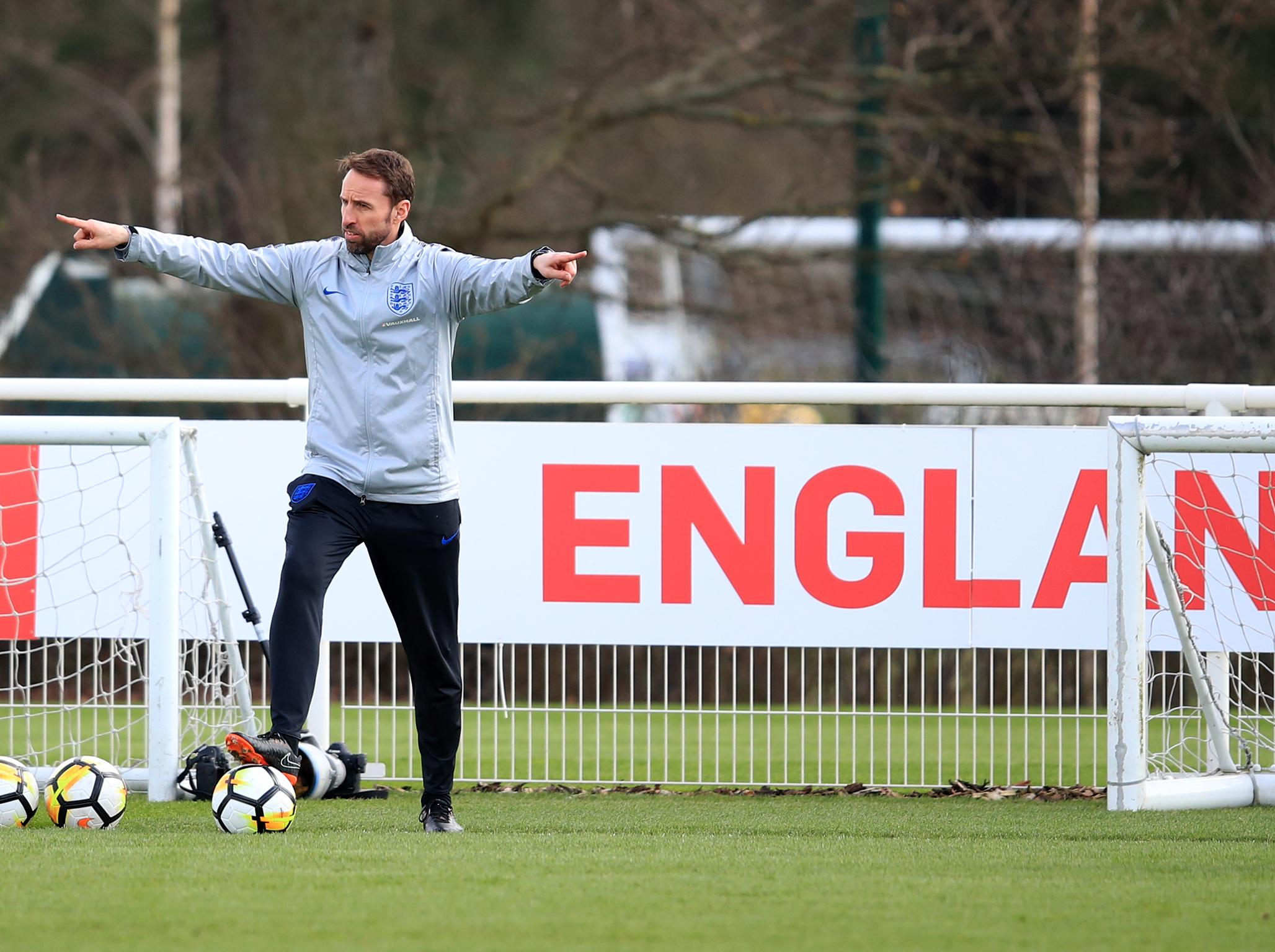 Gareth Southgate takes a training session ahead of the Italy game
