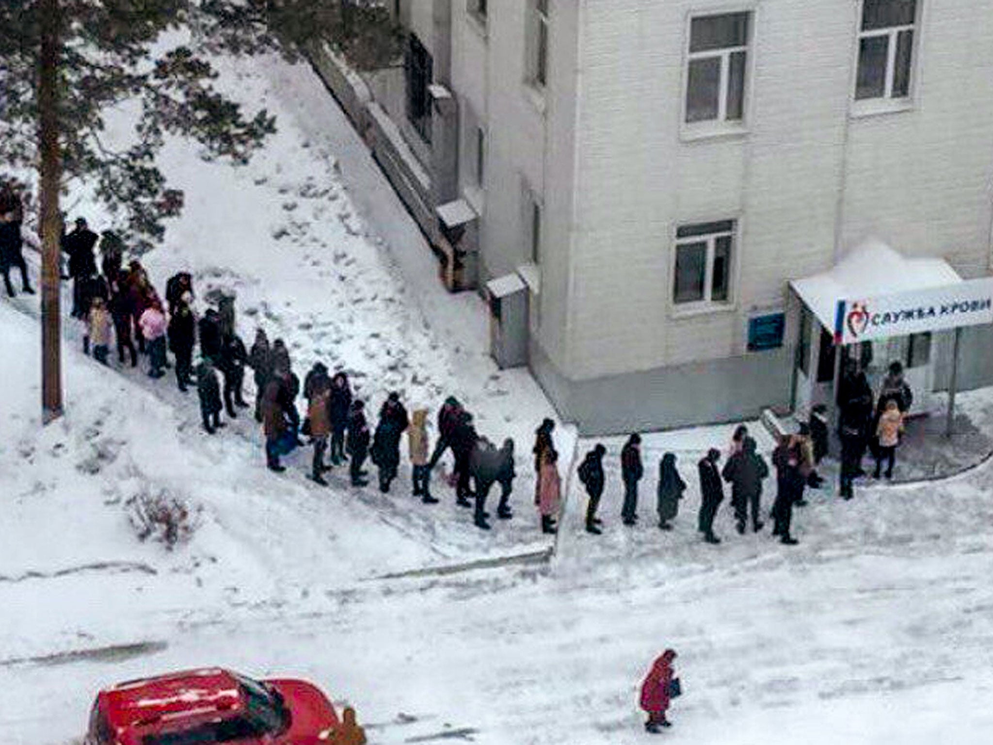 Volunteers queue up to donate blood