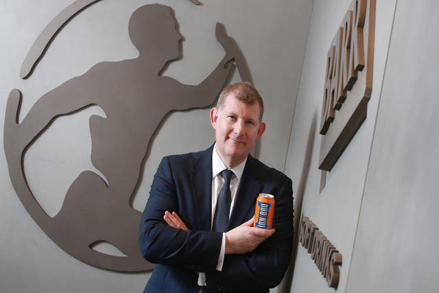 AG Barr boss Roger White with a can of Irn Bru