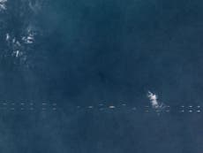 Satellite images reveal Chinese navy's show of force in disputed sea