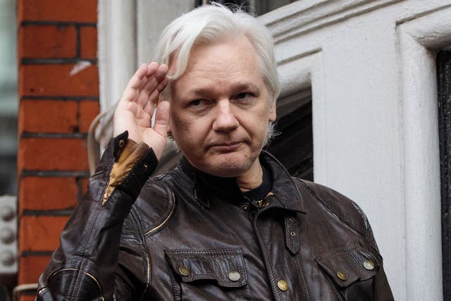 In response Julian Assange says: 'Better a "worm", a healthy creature that invigorates the soil, than a snake'