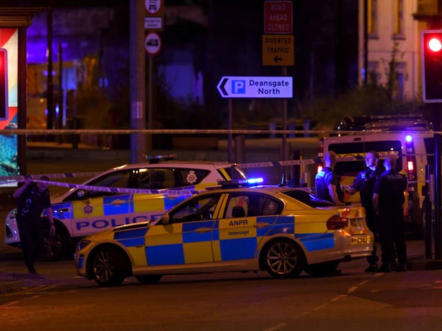 Police officers at the Manchester Arena bomb scene