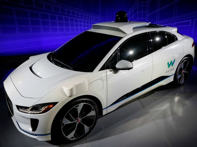 A Jaguar I-PACE self-driving car is pictured during its unveiling by Waymo