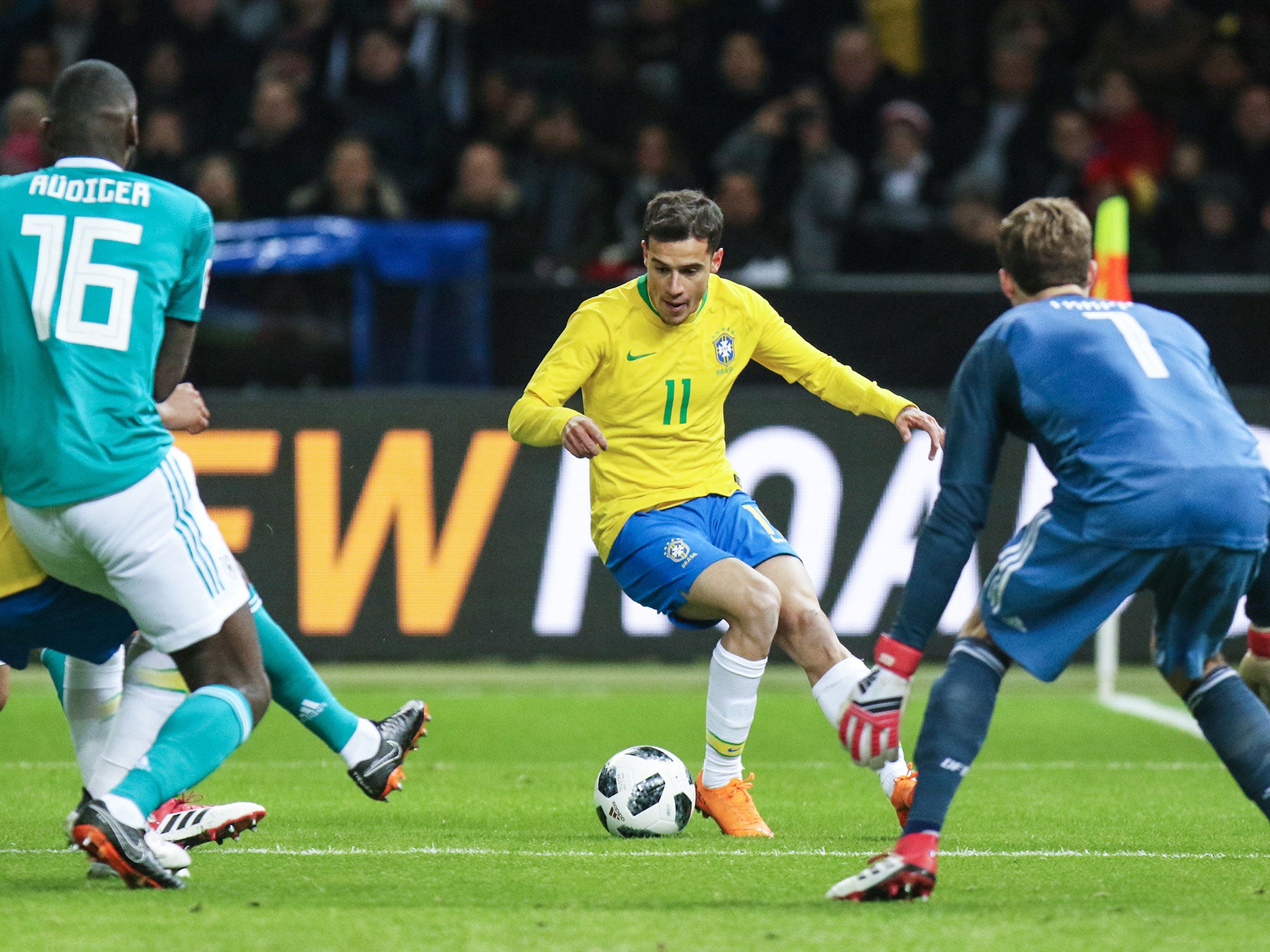 Philippe Coutinho bears down on Germany's goal