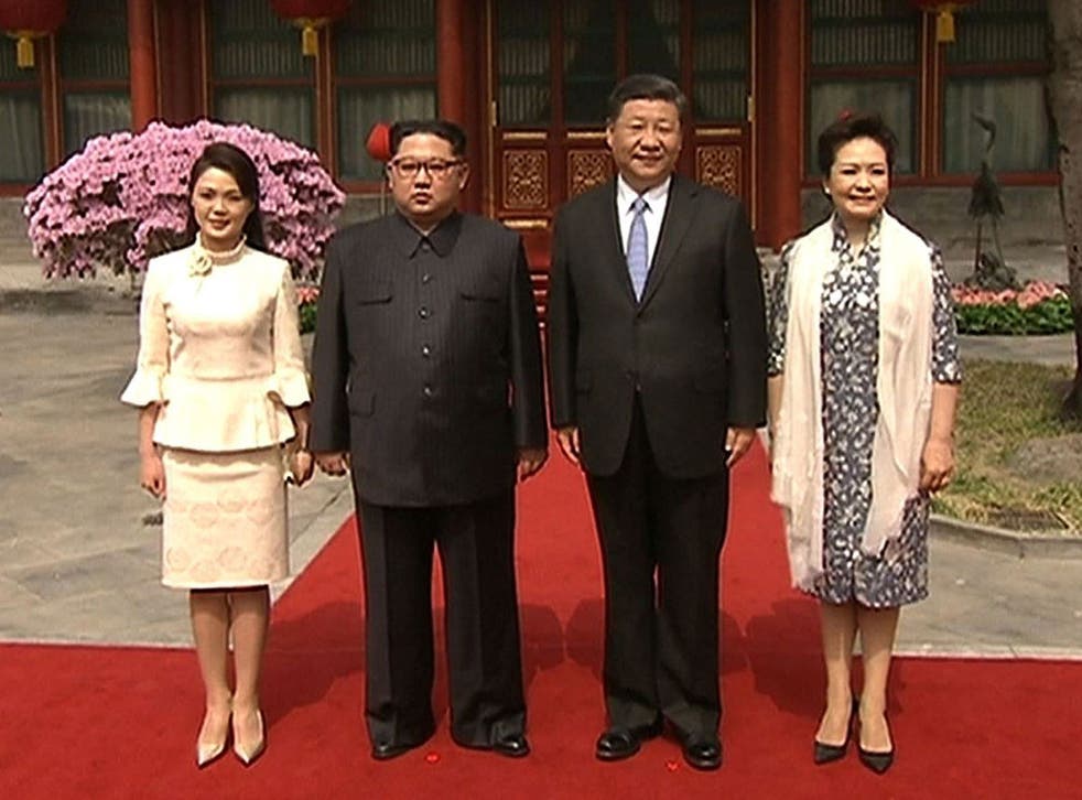North Korean leader Kim Jong-un, President Xi Jinping and both their wives meet in Beijing