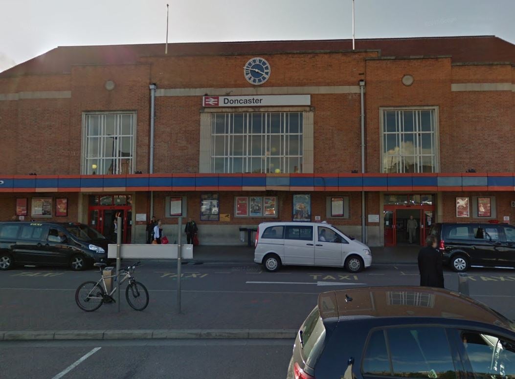 A man and woman died after being struck by a train at Doncaster railway station