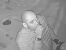 Man caught on CCTV crossing himself before robbing shop