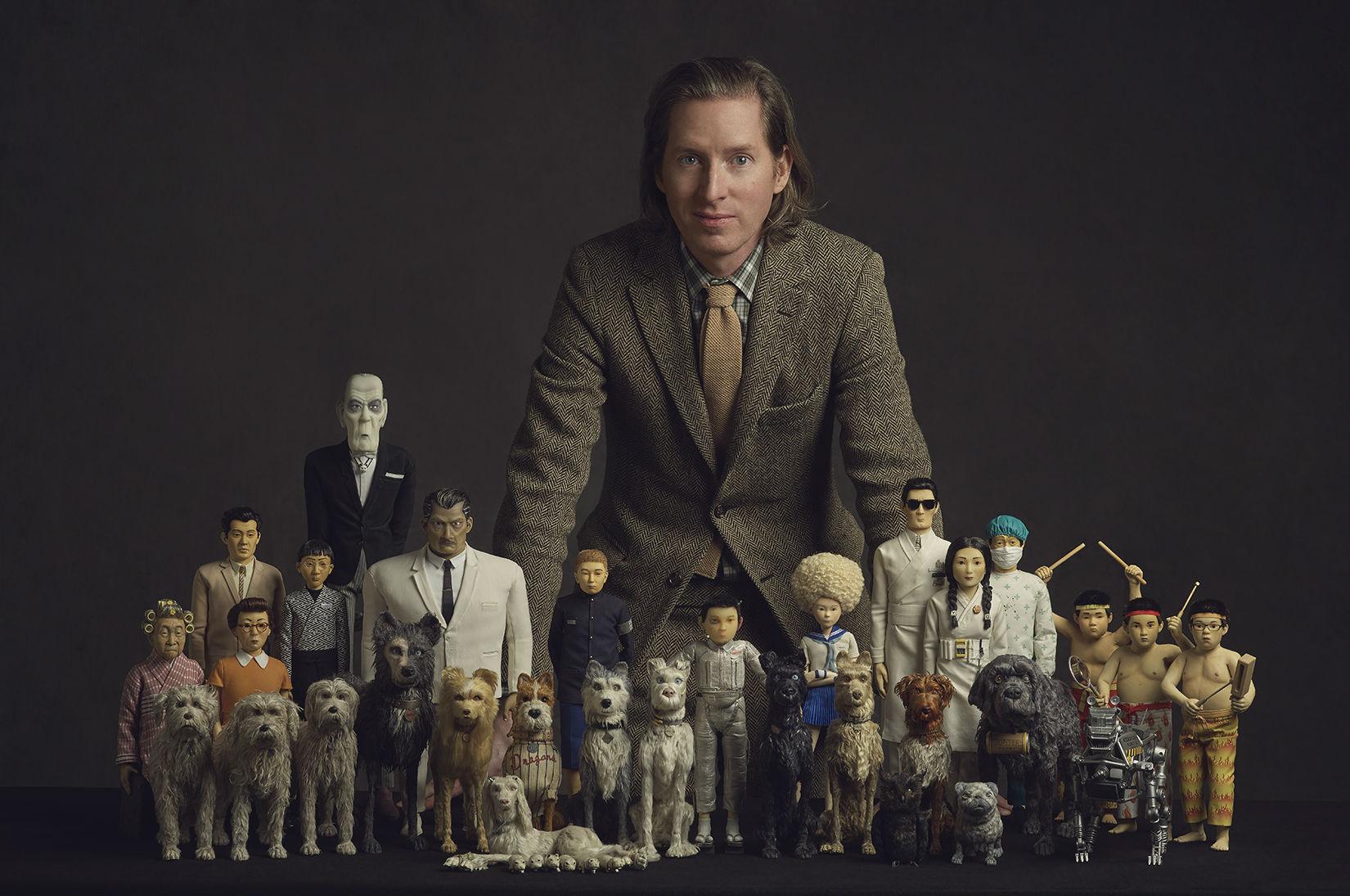 Director Wes Anderson with the puppets used in his Japanese-set animation
