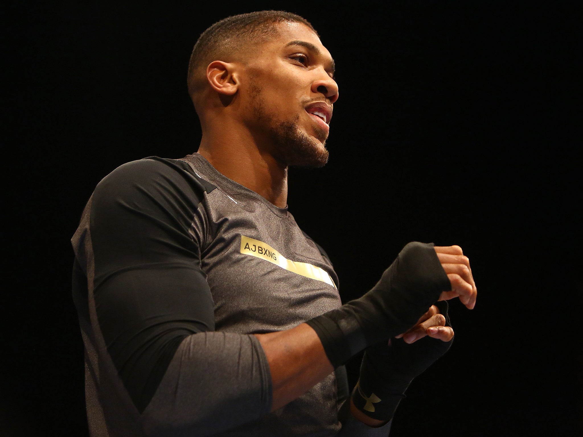 Joshua defends his WBA and IBF heavyweight titles against WBO champion Parker