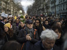 Crowds flock to Paris after 'antisemitic' murder of Holocaust survivor