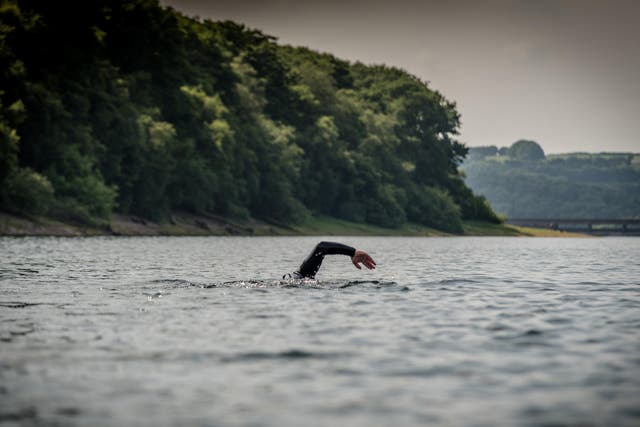Swimmer participating in Exmoor Open Water Swim, one of the events set to cut out single-use plastics this year
