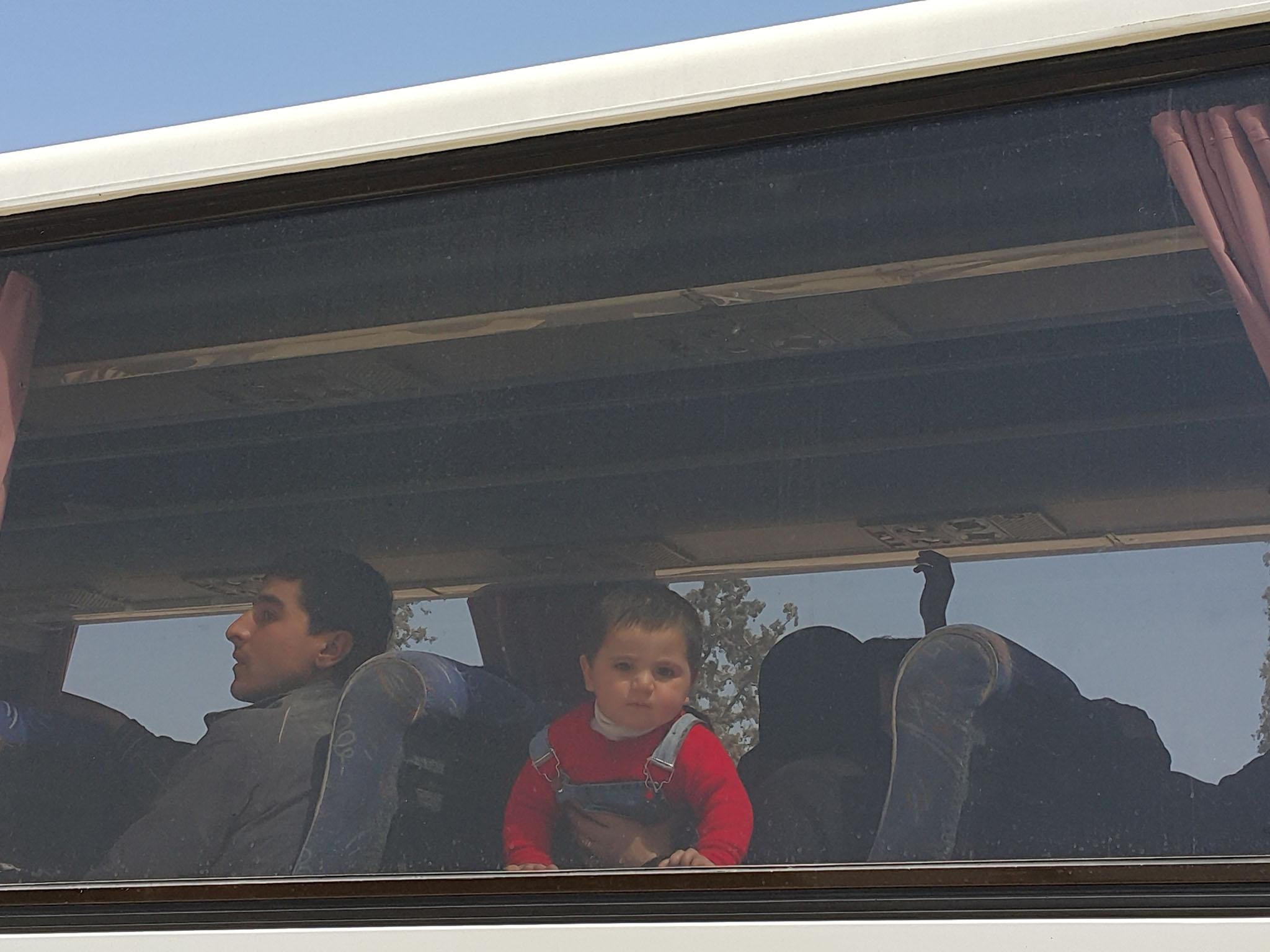 The fighters left for Idlib province with their families.