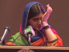 Malala breaks down in tears as she returns to Pakistan