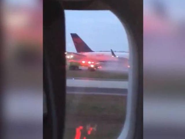 Footage shows Delta Airlines landing gear on fire
