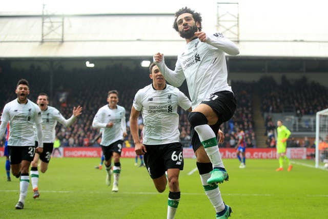 Mohamed Salah leaps into the air after scoring the winning goal in Liverpool's 2-1 victory over Crystal Palace