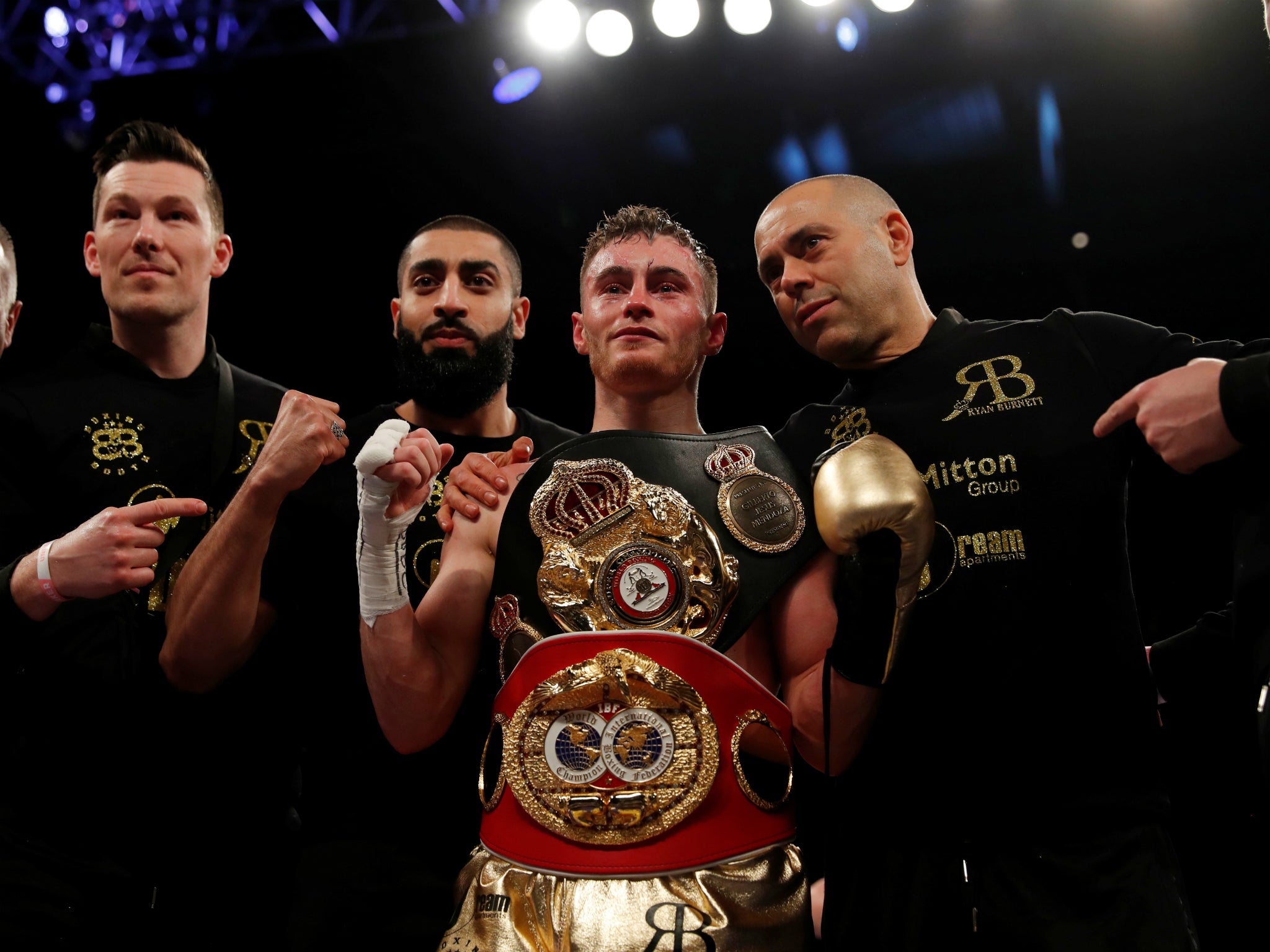 Ryan Burnett claimed a unanimous victory despite suffering a suspected broken right hand