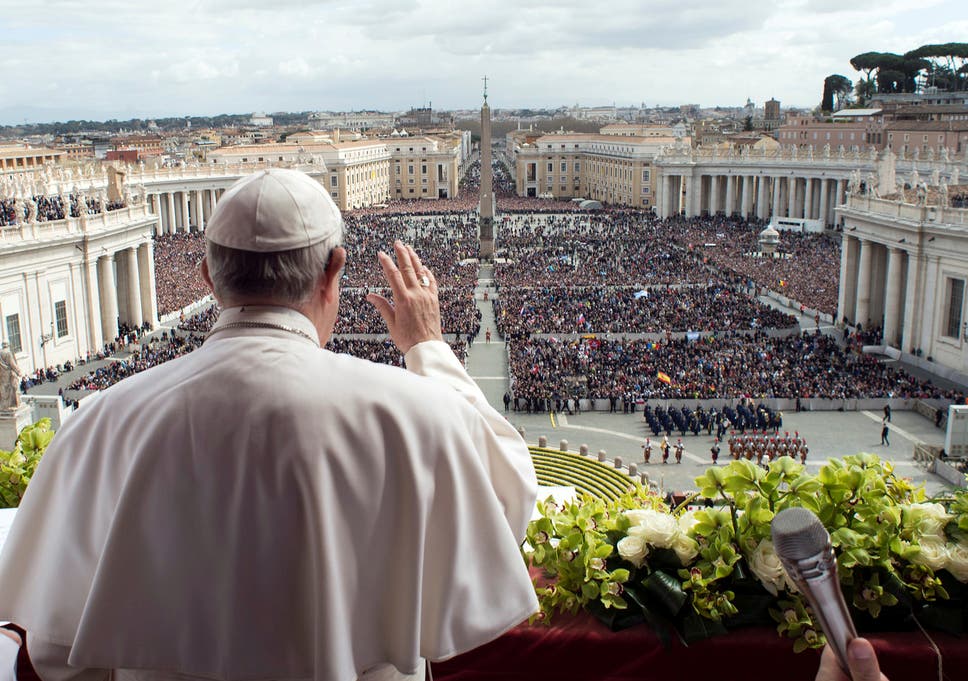 Pope Francis appears before the crowd in St Peter's Square on Easter Sunday