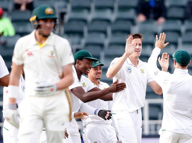 South Africa celebrate the wicket of Matt Renshaw