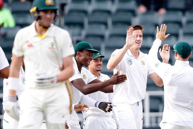 South Africa celebrate the wicket of Matt Renshaw
