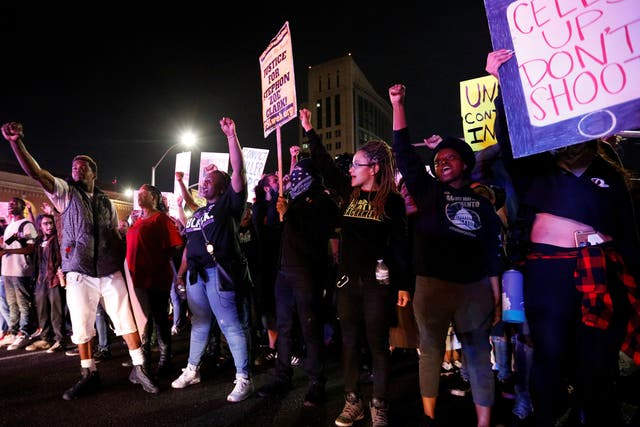 Demonstrators protest the police shooting of Stephon Clark, in Sacramento, California