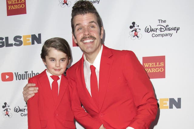 Perez Hilton and his son Mario. Credit: Valerie Macon/AFP/Getty Images