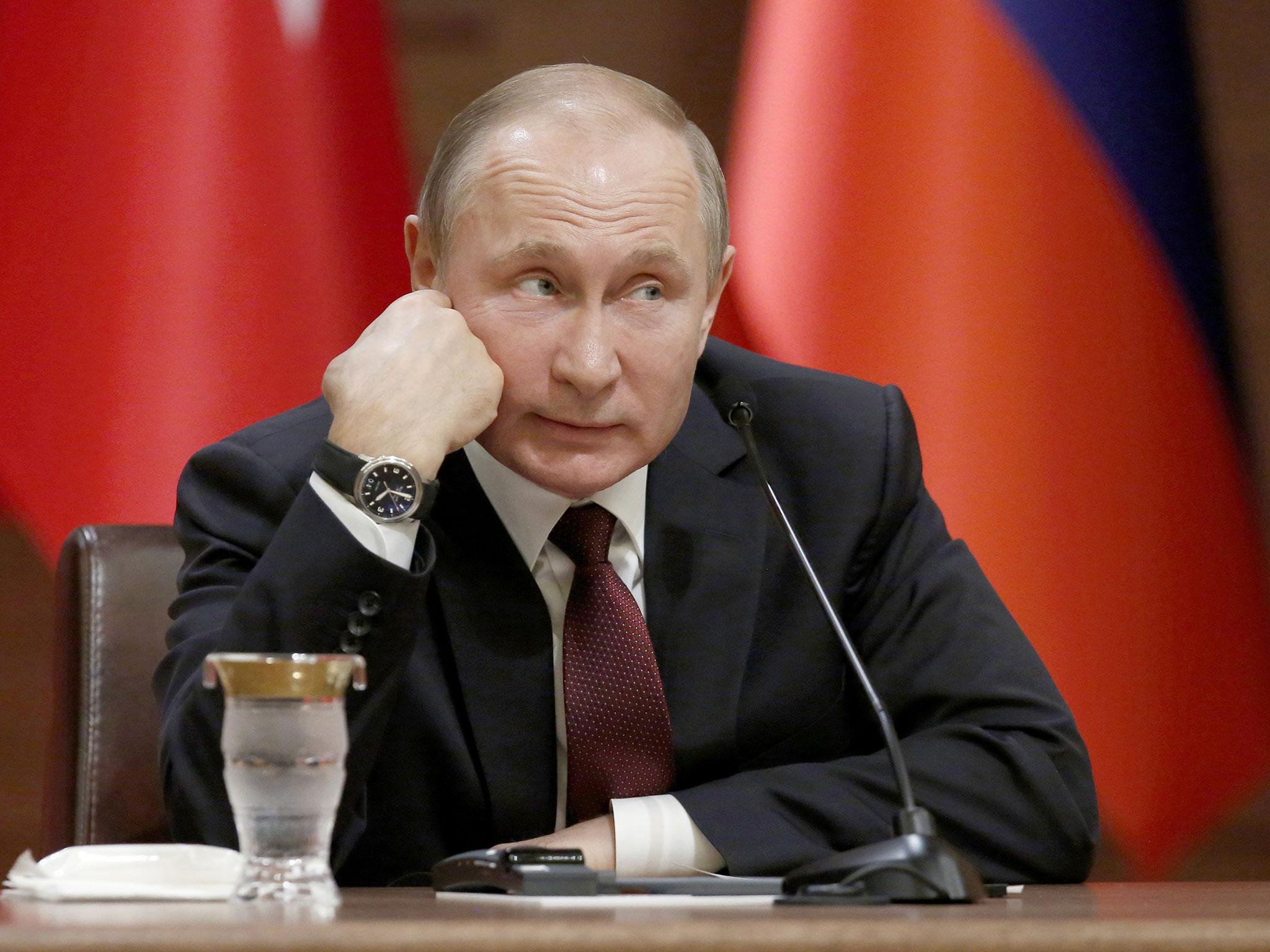 Vladimir Putin has denied sponsoring cyber attacks around the world