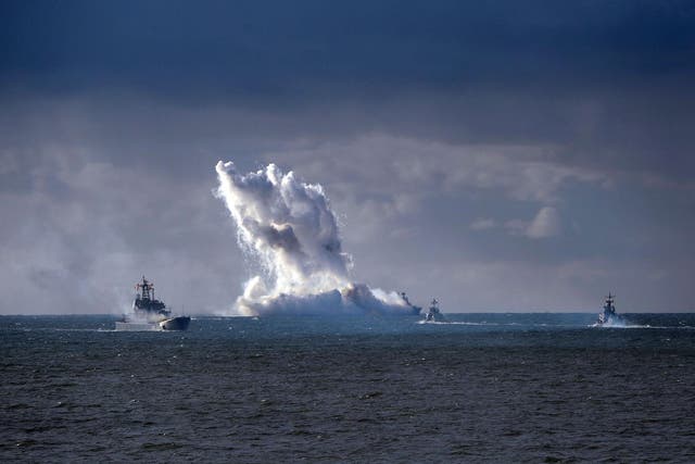 Russian military vessels conduct drills during the joint war games Zapad-2013, in the Baltic Sea