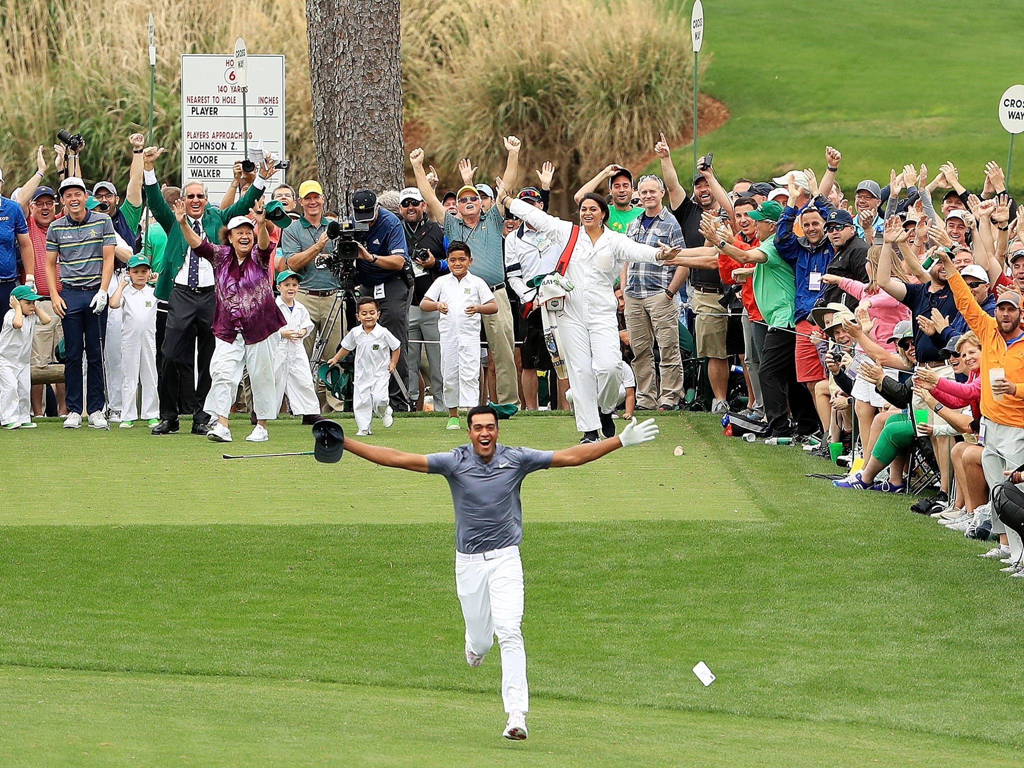 Finau sprinted down the fairway to celebrate his hole-in-one