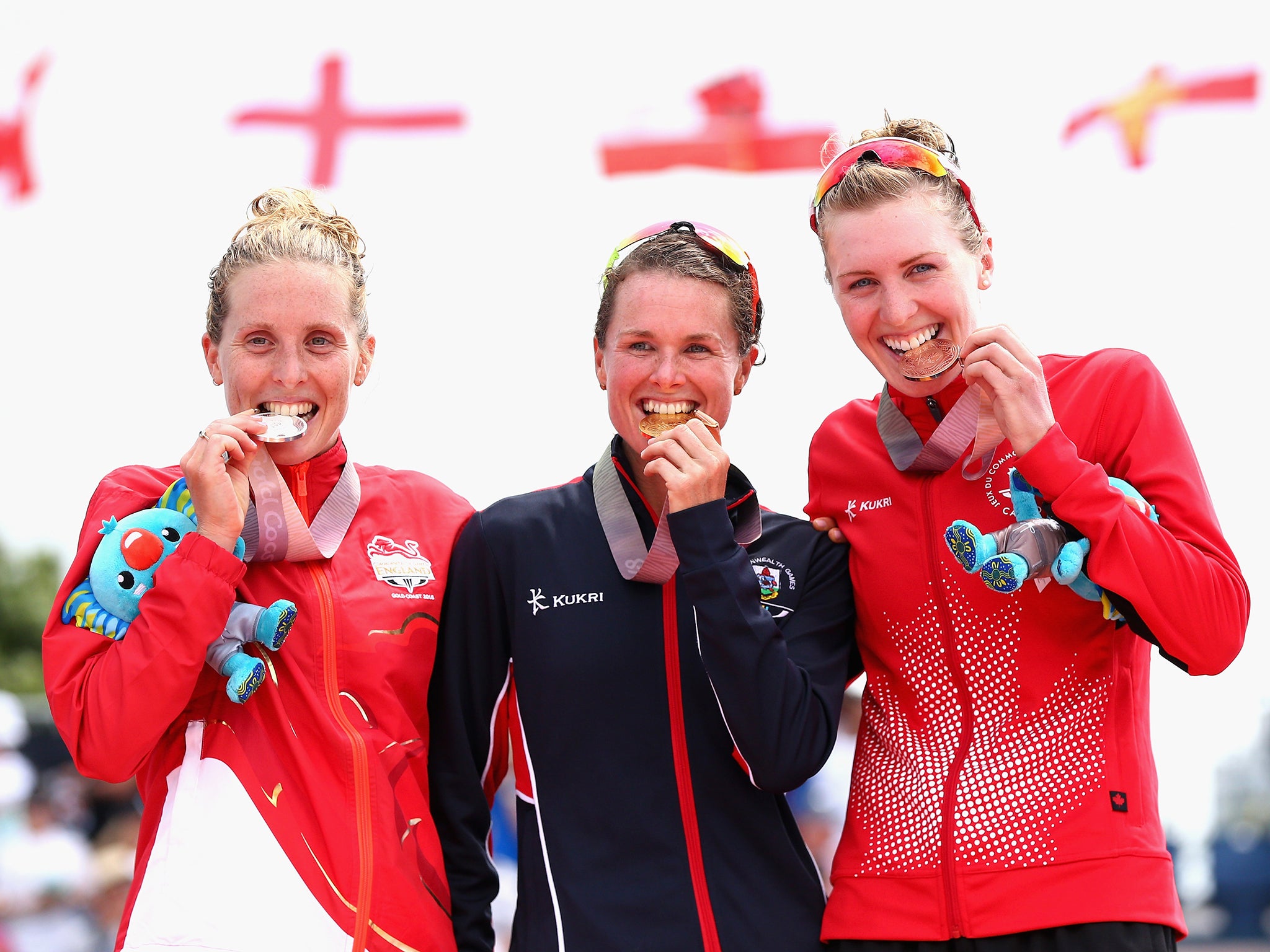 Jessica Learmonth (left) claimed the bronze medal in the women's triathlon