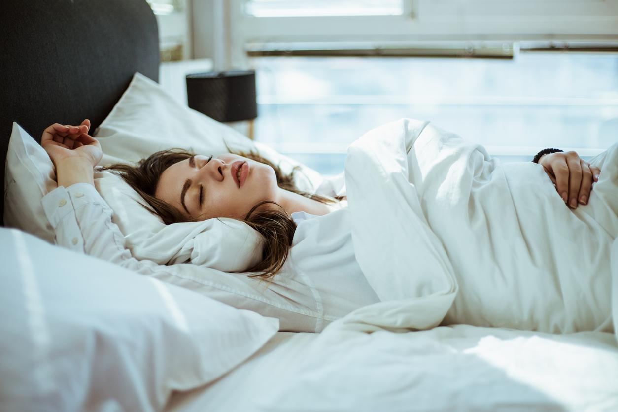 How to Sleep on Your Back, According to Sleep Experts