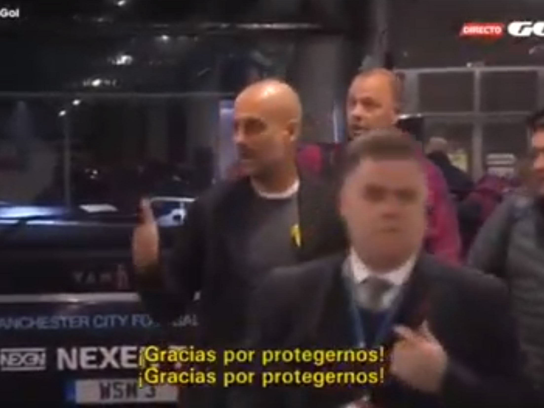 Guardiola gives a thumbs up to security staff