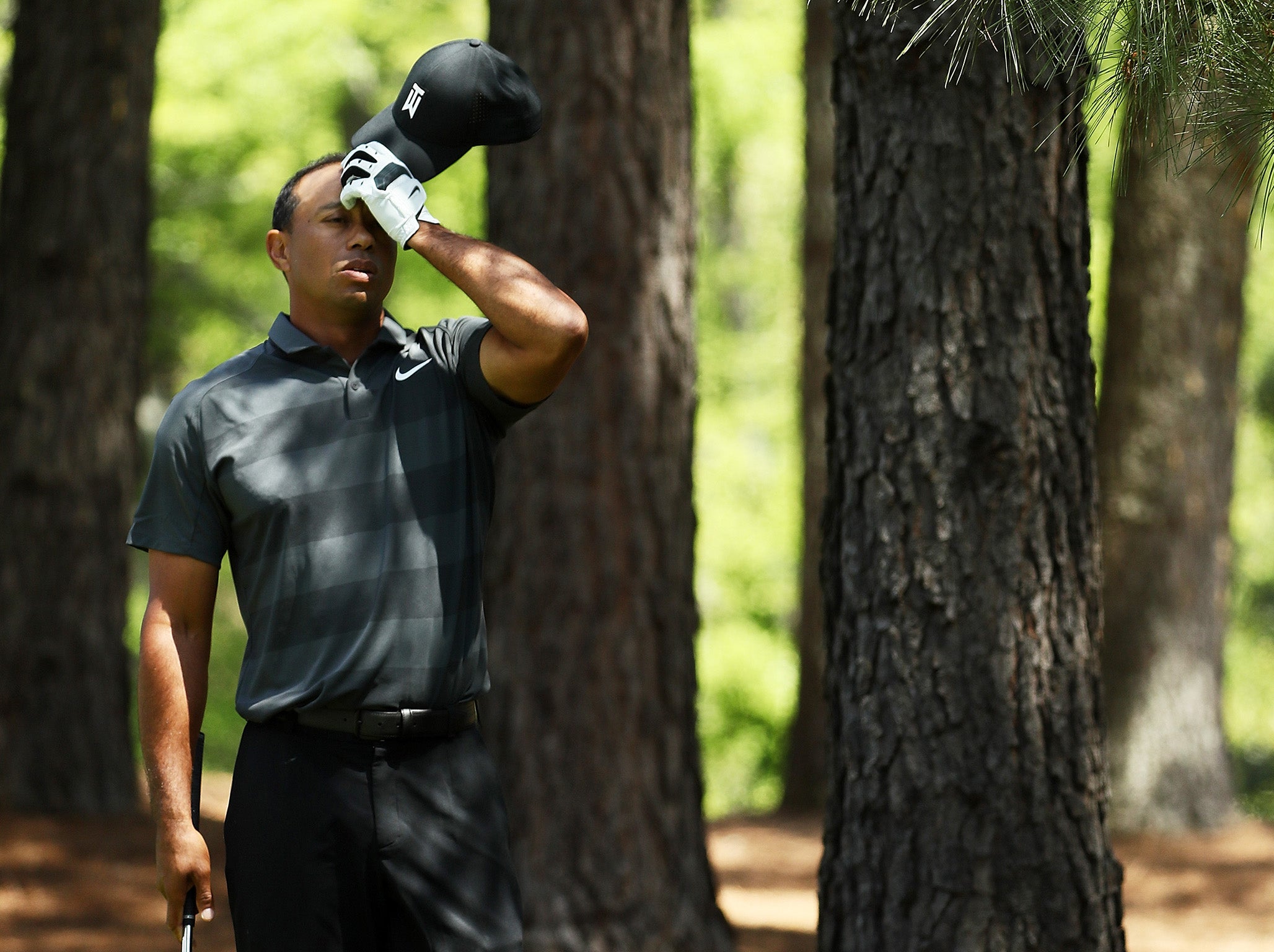Tiger Woods bogeyed the fourth and fifth after finding sand off the tee