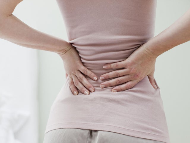 Best way to avoid back pain? Lift heavy things | The Independent | The ...