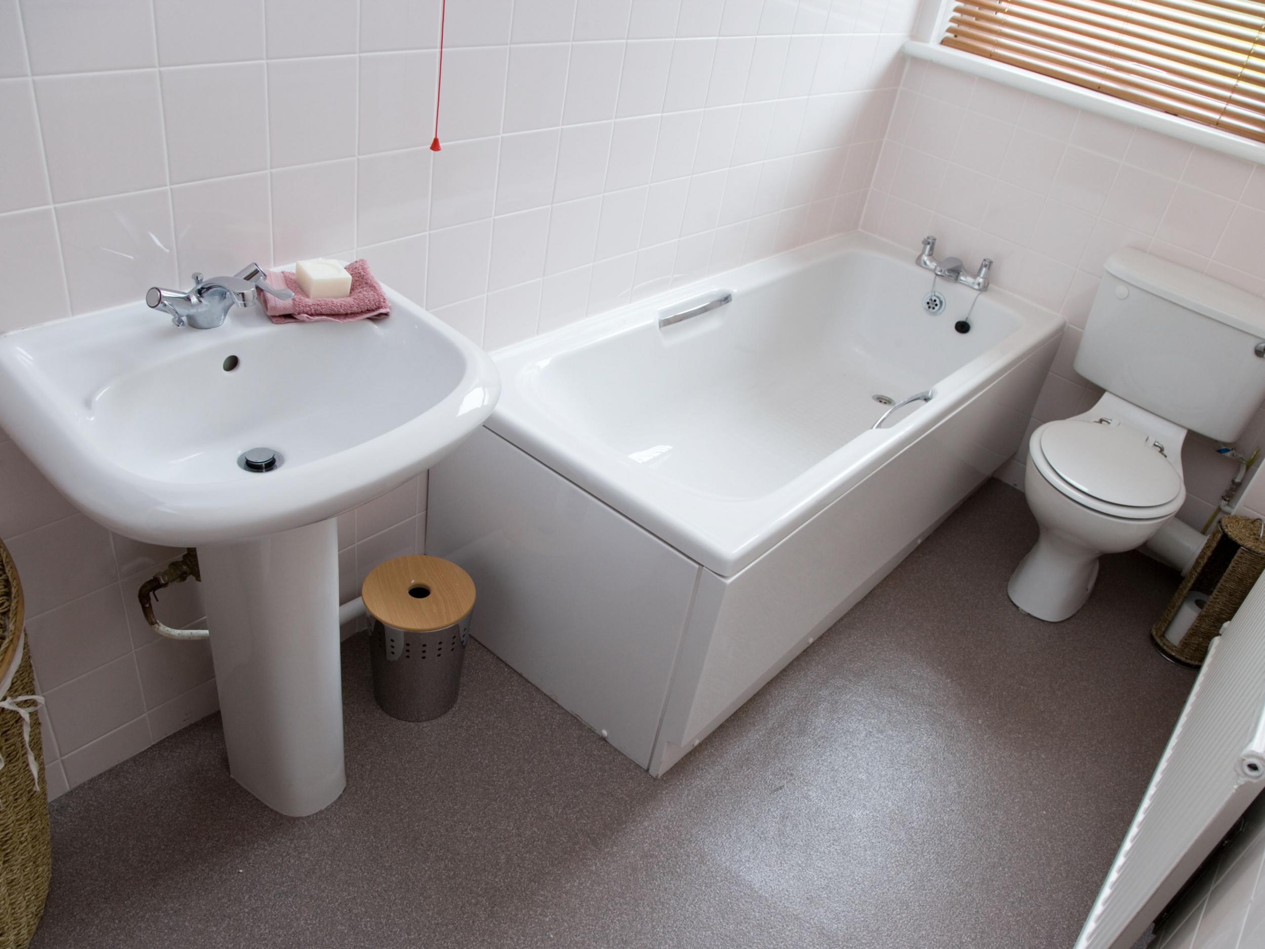 An elderly man returned home to find an intruder in his bath