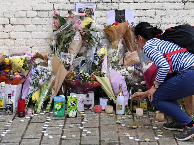 Flowers and tributes left for 18-year-old Israel Ogunsola, who was stabbed to death in Hackney last April