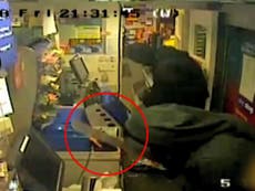 CCTV shows moment masked men with machetes raid Manchester shop