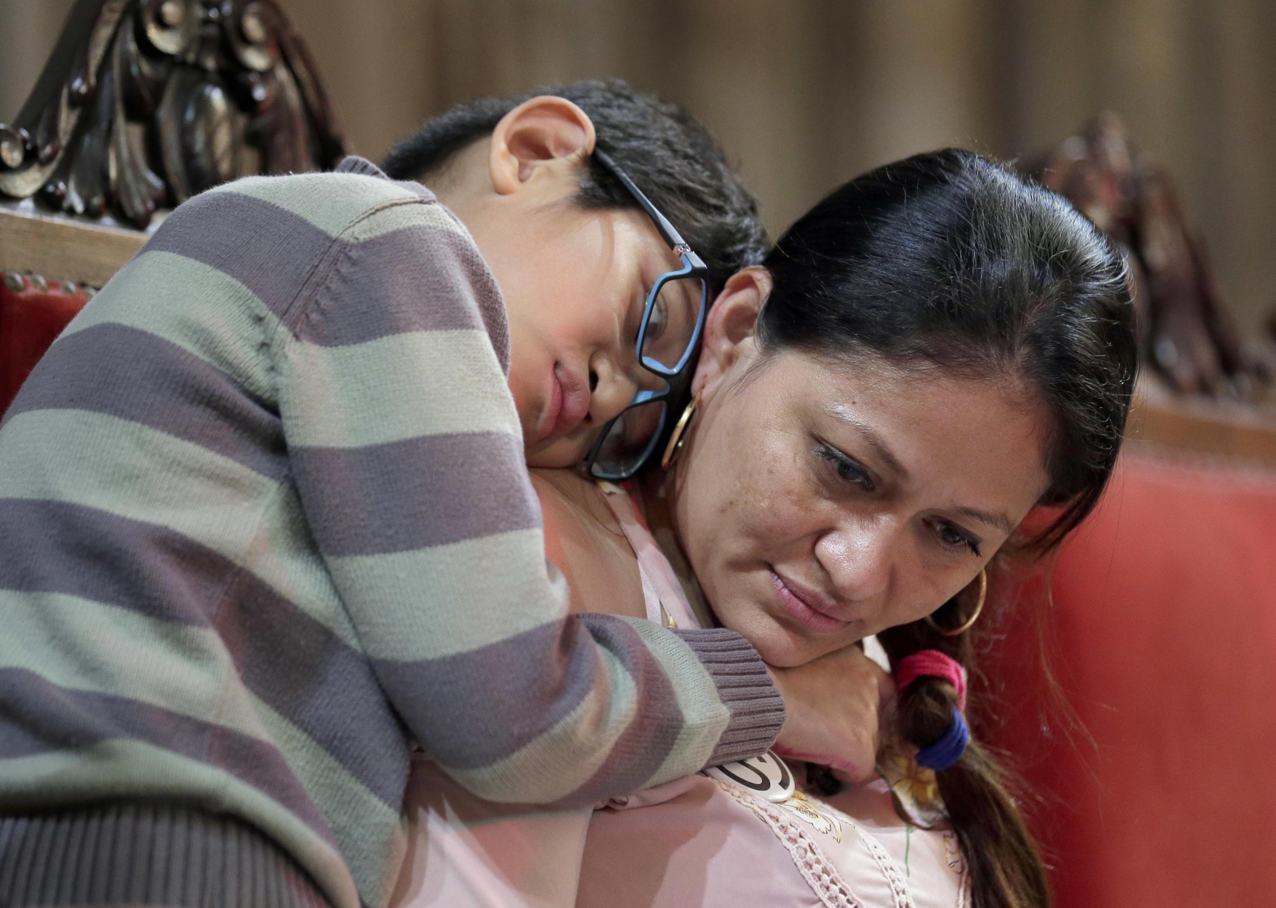 Aura Hernandez with her son Danny who she only gets to see at weekends