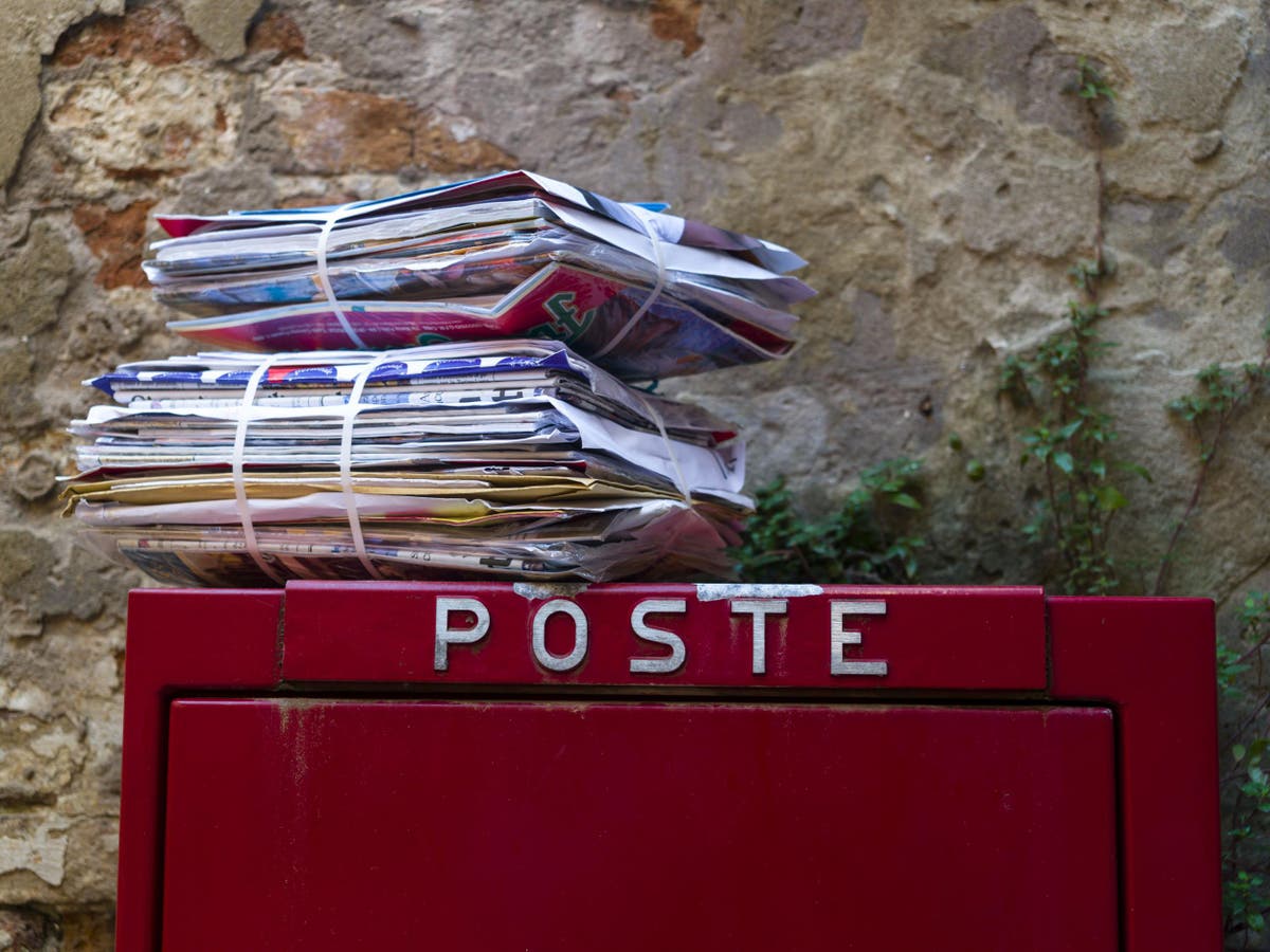 Postman arrested after storing mail in his house for three years because he 'wasn't paid enough'