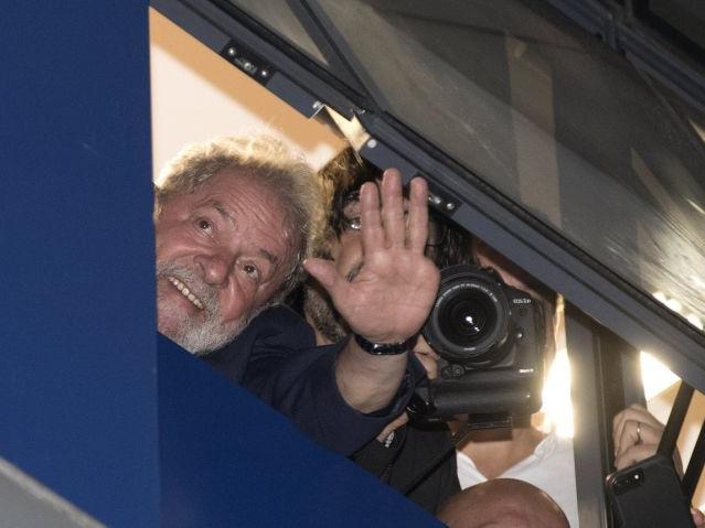 Brazil's ex-President 'Lula' greets his supporters from union building window
