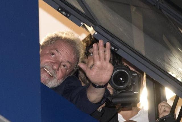 Brazil's ex-President 'Lula' greets his supporters from union building window