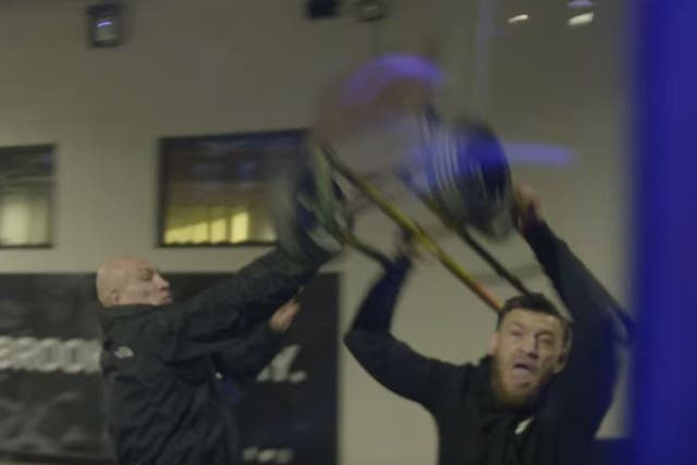Conor McGregor throws a sack trolley at the bus of Khabib Nurmagomedov at the UFC 223 media day
