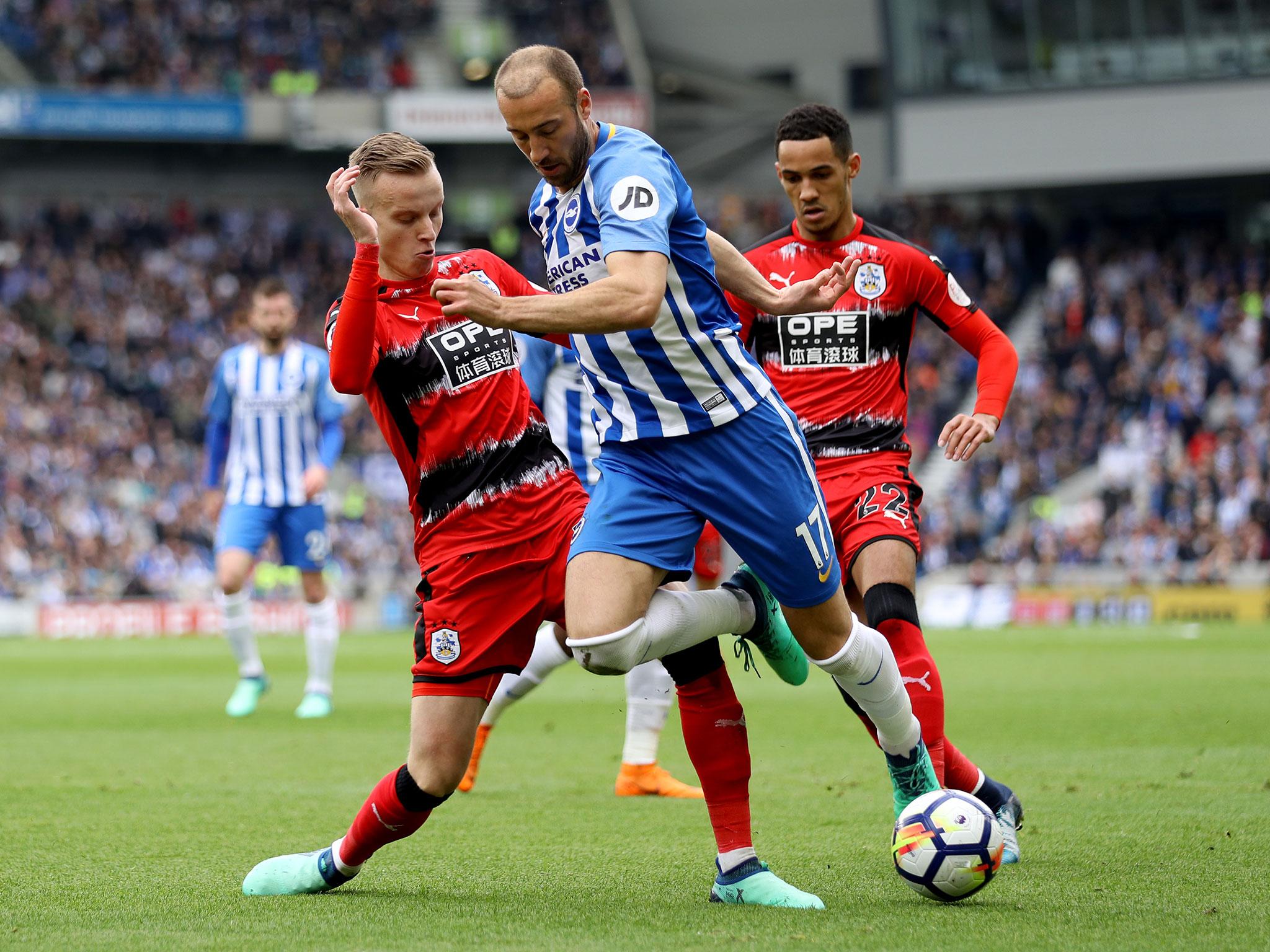 &#13;
Glenn Murray attempts to take the ball past Florent Hadergjonaj &#13;