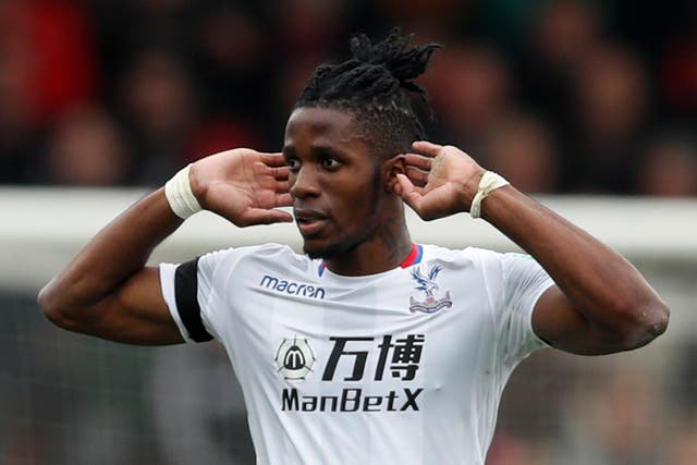 Wilfried Zaha celebrates after scoring for Crystal Palace against Bournemouth