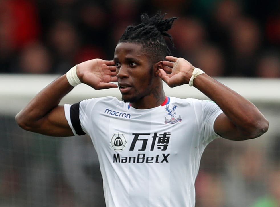 Wilfried Zaha celebrates after scoring for Crystal Palace against Bournemouth