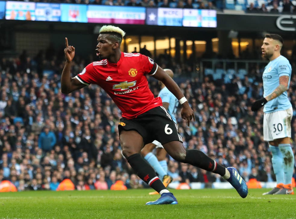 Paul Pogba celebrates clinching United's second of the evening
