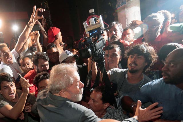Former Brazilian president Luiz Inacio Lula da Silva leaves the steel workers union