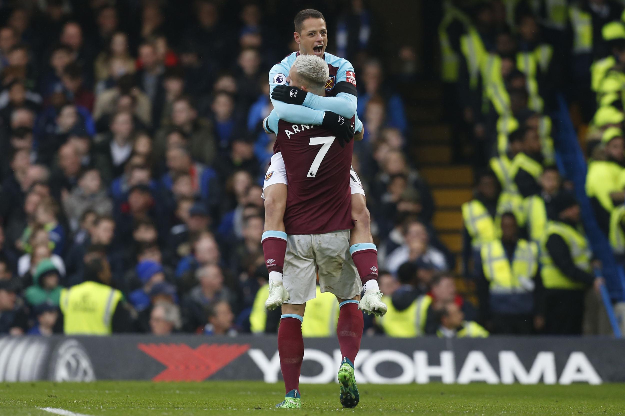 Javier Hernandez celebrates with Marko Arnautovic