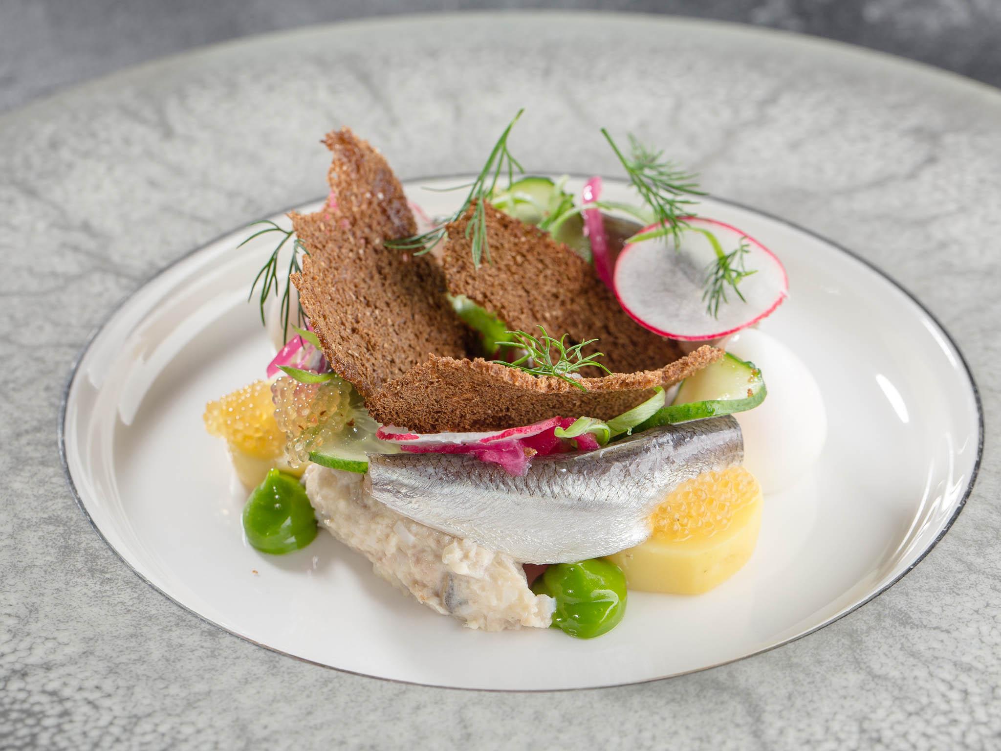 &#13;
Vorschmack with herring, pike caviar and rye bread at Savva restaurant &#13;